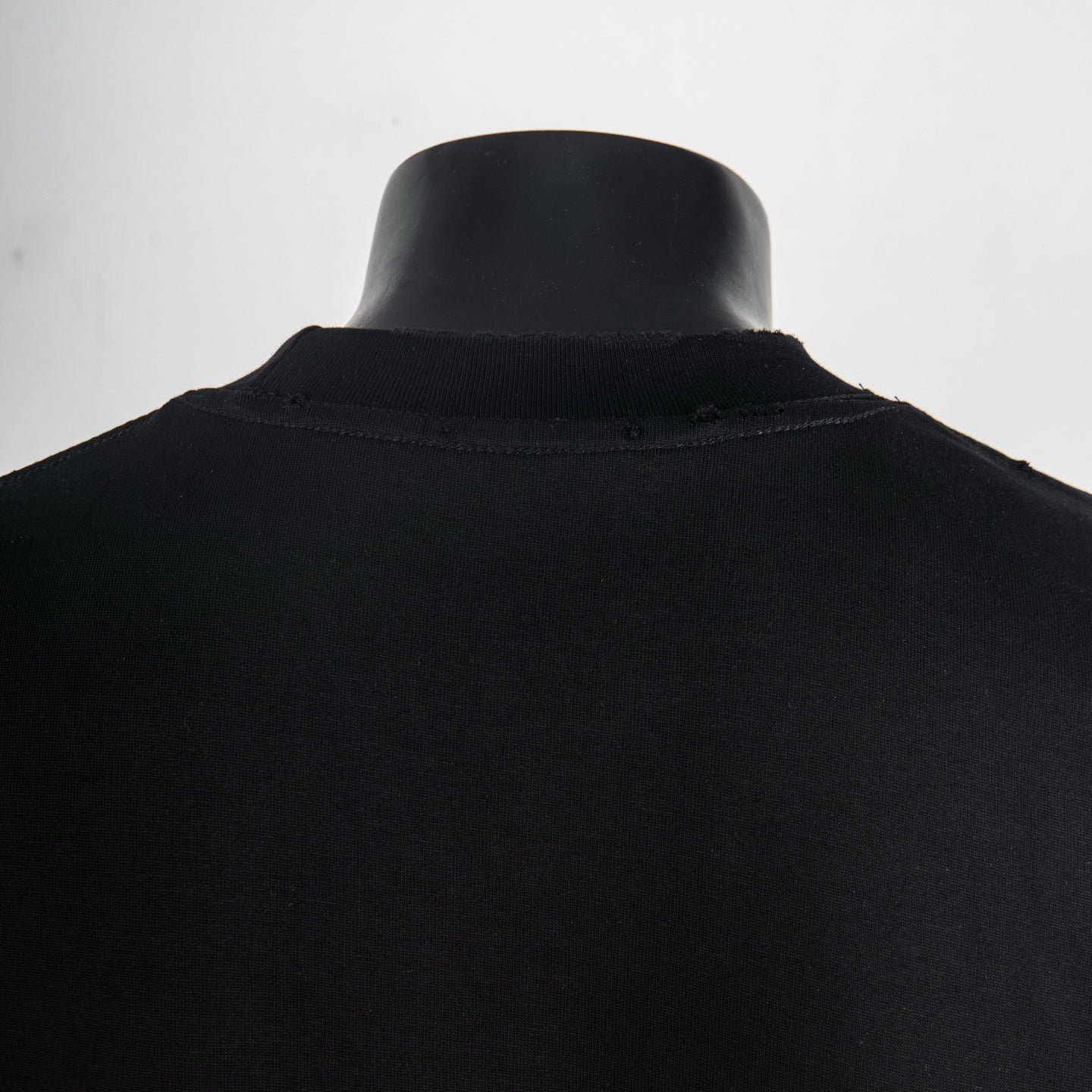 Black T-shirt back neckline with short sleeves