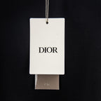 Black T-shirt with hanging Dior tag