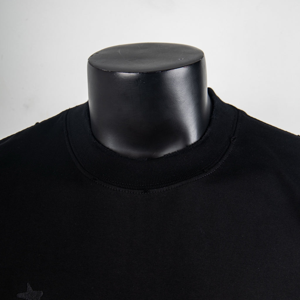 Black short-sleeve T-shirt with crew neck close-up