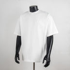 White short-sleeve T-shirt with small Dior logo on chest