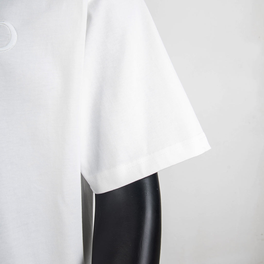 White T-shirt side drape and hem
