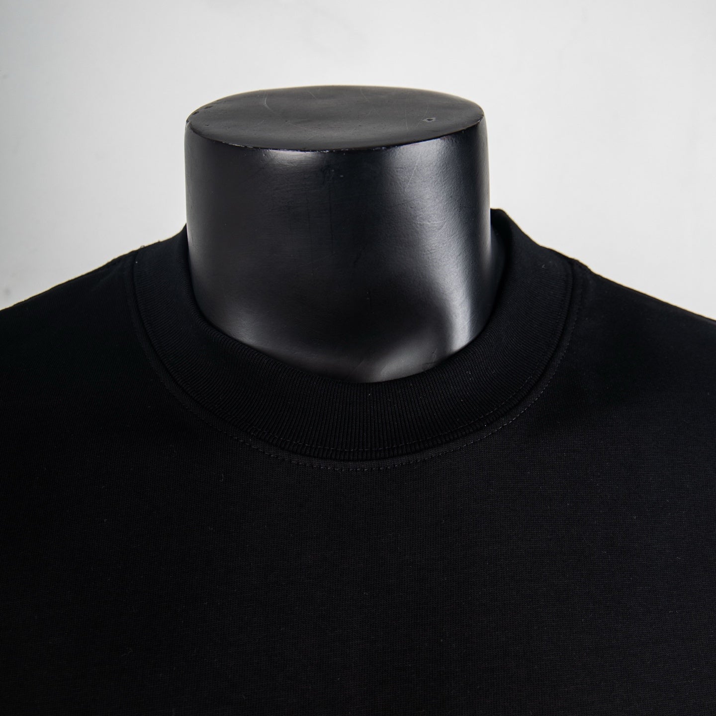 Dior black short-sleeve T-shirt neckline close-up