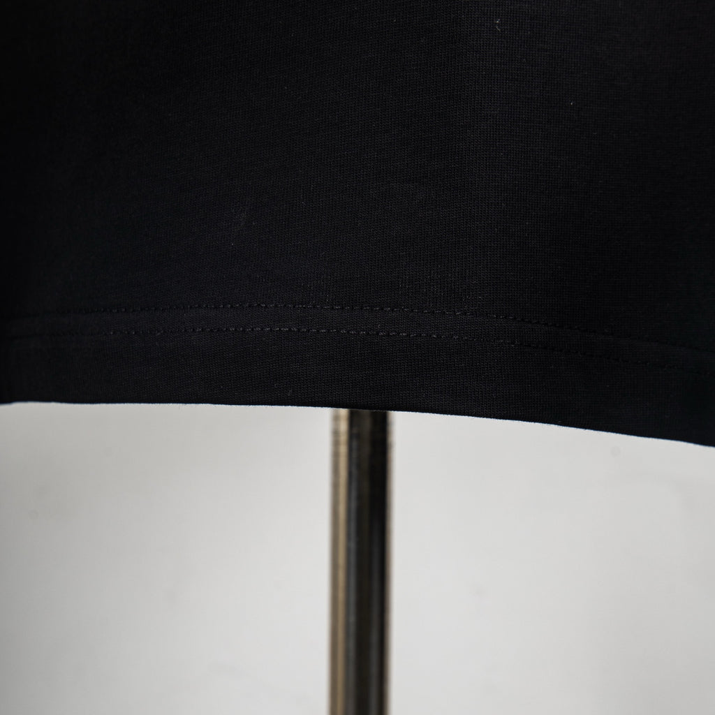 Dior black T-shirt hem with visible stitching