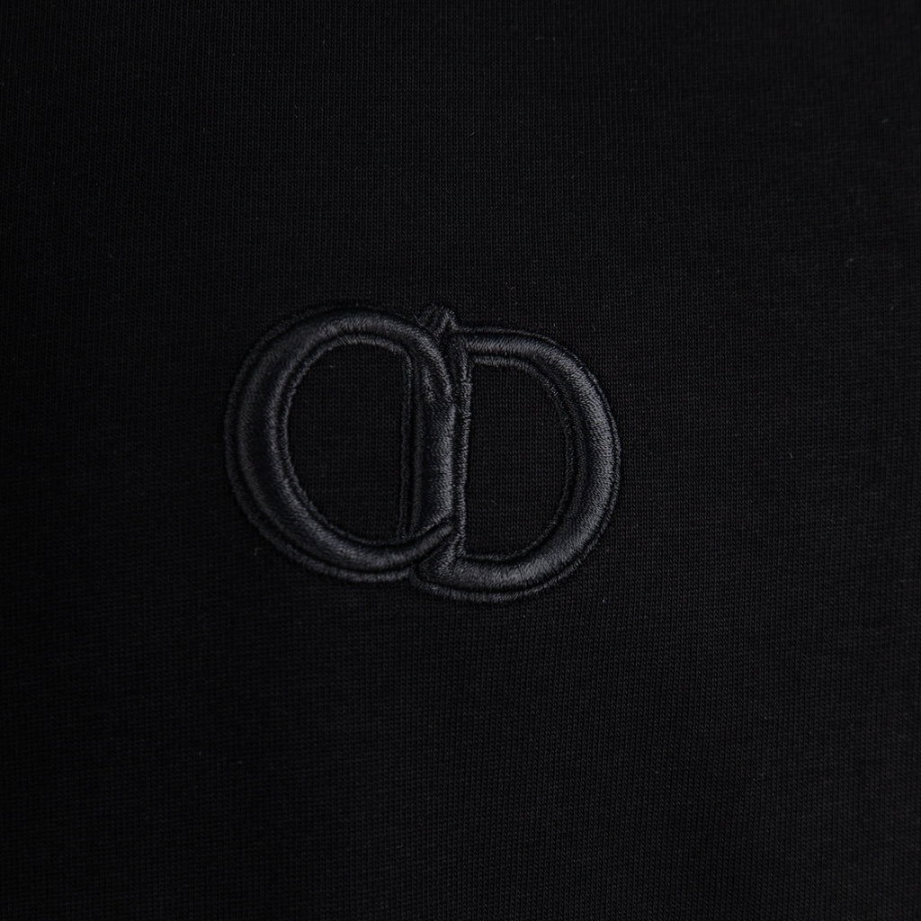 Dior monogram emblem on black T-shirt chest