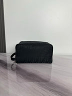 Fendi dark crossbody bag with FF logo pattern and top zip, front view
