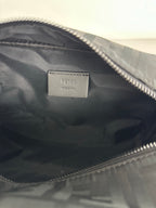 Fendi interior label on fabric lining with visible top zipper and stitching
