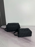 Fendi crossbody bag with dark monogram pattern, dual compartments, zip closure