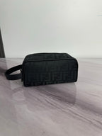 Fendi crossbody bag in dark monogram fabric, front zip pocket, wrist strap