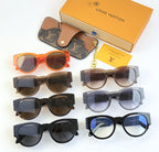 Louis Vuitton sunglasses assortment with orange, brown, and blue tinted lenses