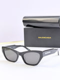 Balenciaga cat-eye sunglasses, black frame with dark lenses