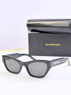 Balenciaga cat-eye sunglasses, black frame with dark lenses