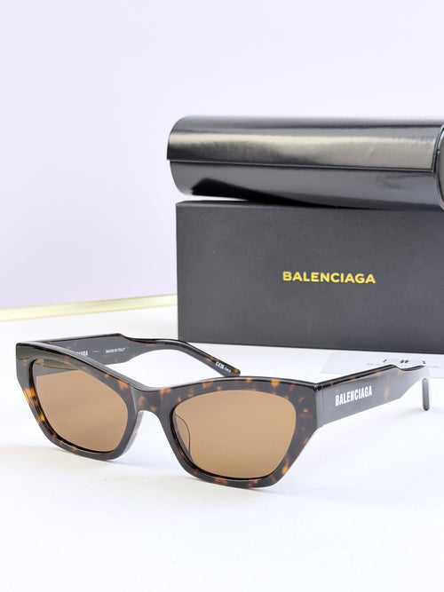 Balenciaga sunglasses, tortoiseshell frame with amber lenses
