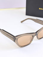 Balenciaga sunglasses, clear frame with tan tinted lenses