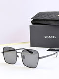 Chanel square sunglasses with black frames and dark gray tinted lenses
