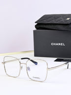 Chanel square eyeglasses with clear frames and subtle blue tinted lenses
