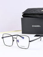 Chanel square eyeglasses with black frames and blue tinted lenses