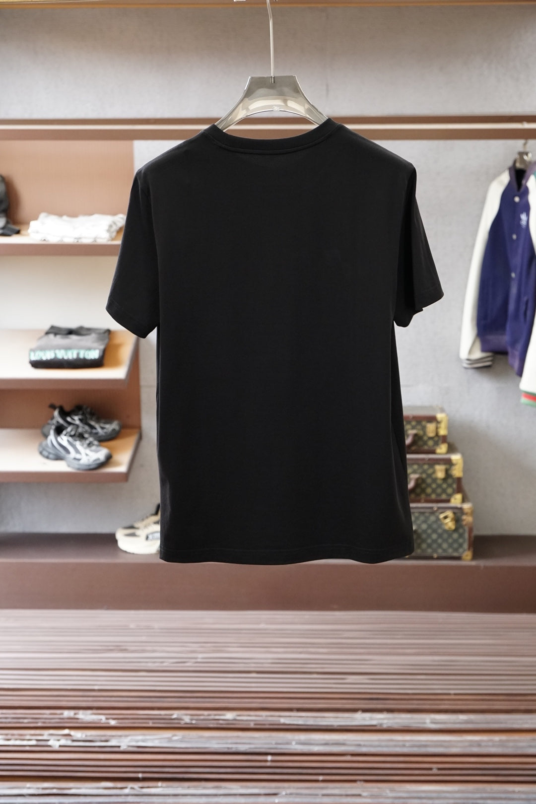 Black crewneck T-shirt, back view with plain design