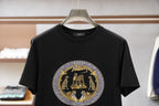 Black Versace crewneck T-shirt with ornate round emblem graphic at chest