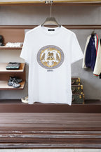 White Versace crewneck T-shirt with gold emblem graphic on the chest