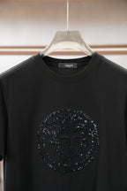 Versace black crewneck T-shirt with large circular embellished Medusa logo