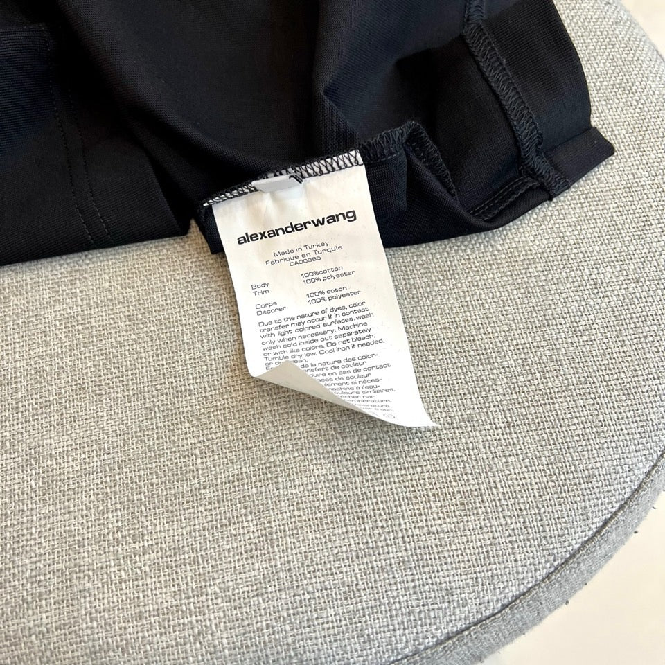 Black T-shirt interior neck label and care tag