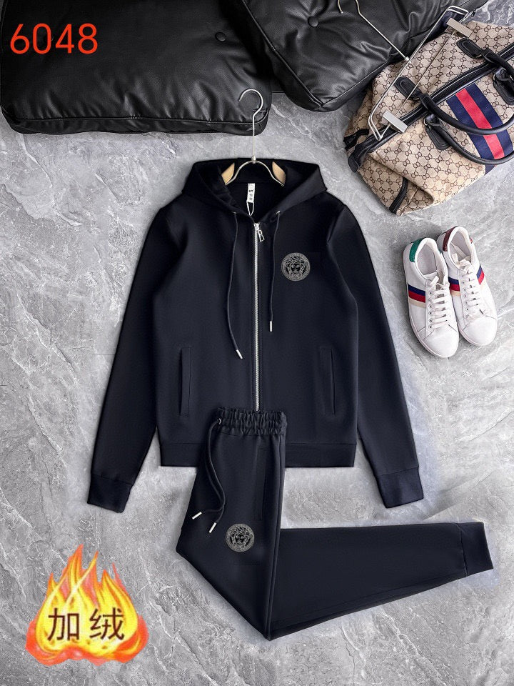 Black hooded zip-up jacket and matching jogger pants set, drawstring waistband