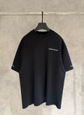 Black short-sleeve T-shirt with small chest logo print and crew neckline