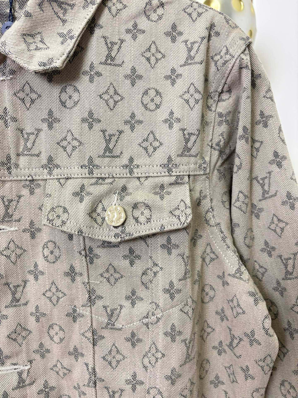 Louis Vuitton monogram long-sleeve jacket chest pocket and front panel close-up