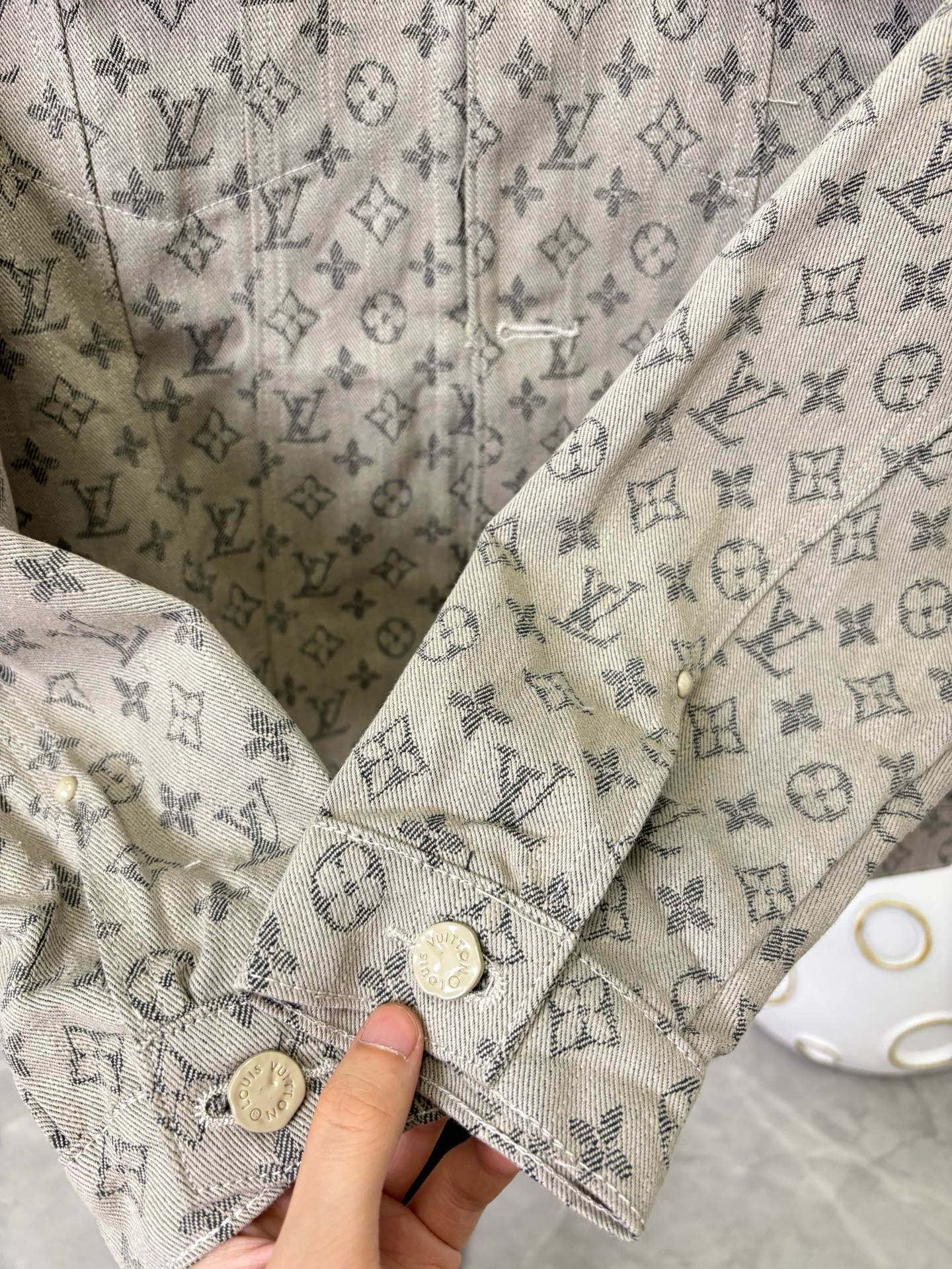 Louis Vuitton monogram long-sleeve jacket sleeve and cuff with buttons and stitching