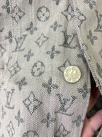 Louis Vuitton monogram long-sleeve jacket fabric close-up with small round button