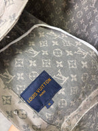 Louis Vuitton monogram jacket inner lining close-up with blue brand label