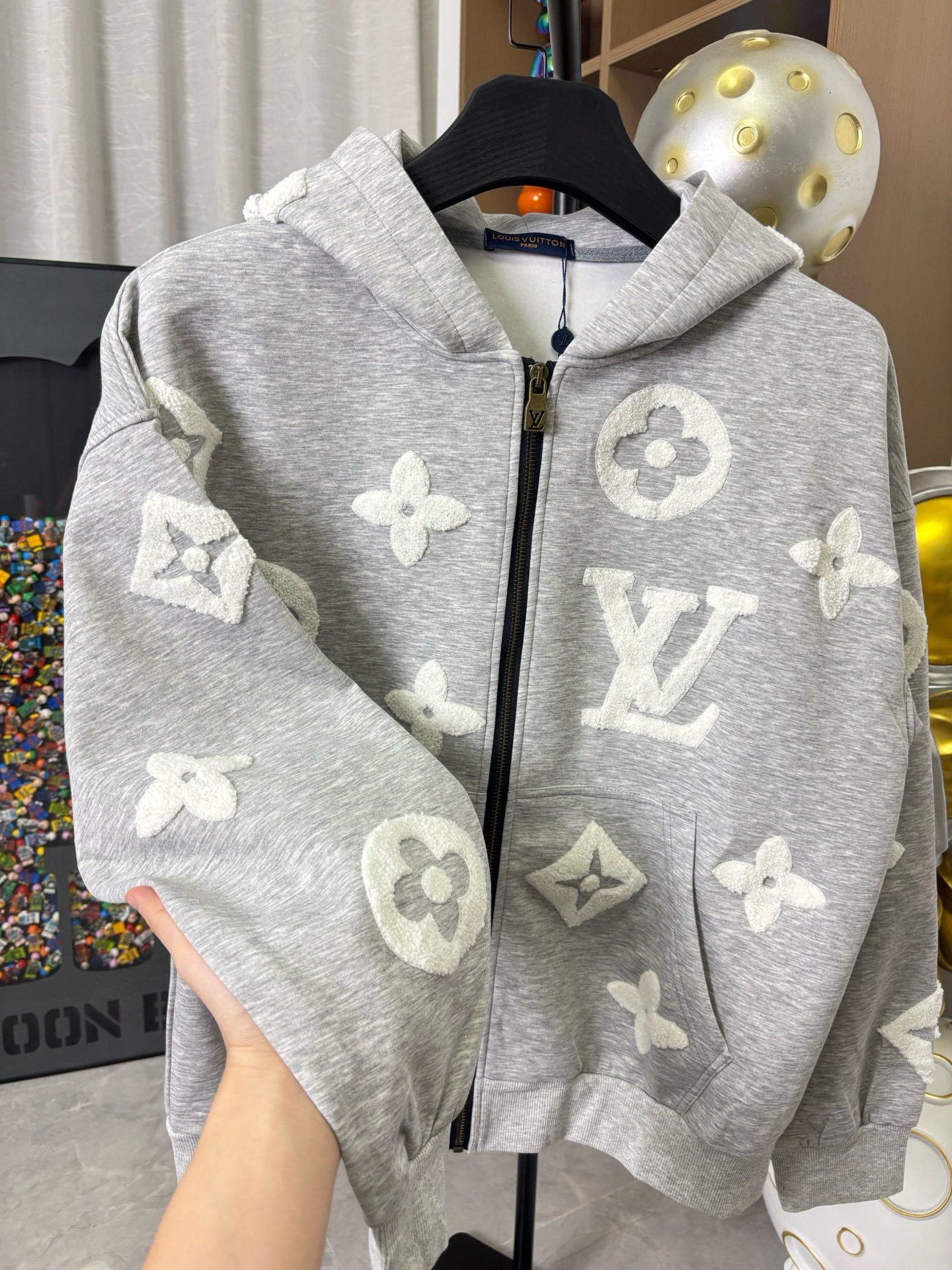 Louis Vuitton gray heather zip-up hoodie with hood, front zipper, and monogram print