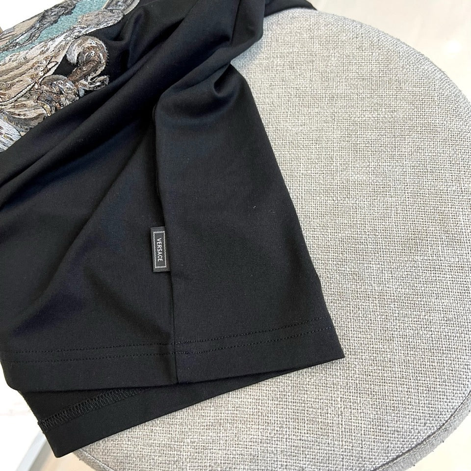 Versace black T-shirt hem with small interior neck label