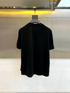 Versace black T-shirt, plain front view on hanger