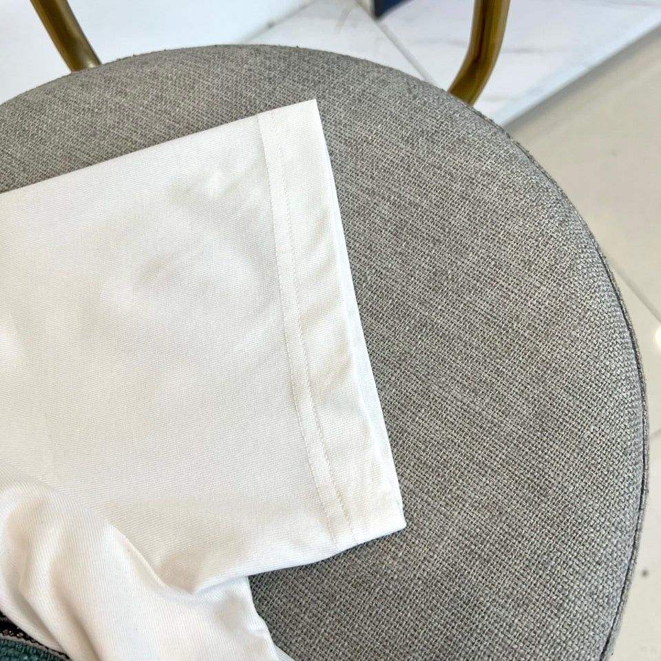 White Versace T-shirt side seam and hem stitching