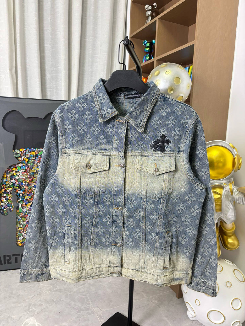 Long-sleeve denim jacket, blue wash, button front, flap chest pockets, distressed dye