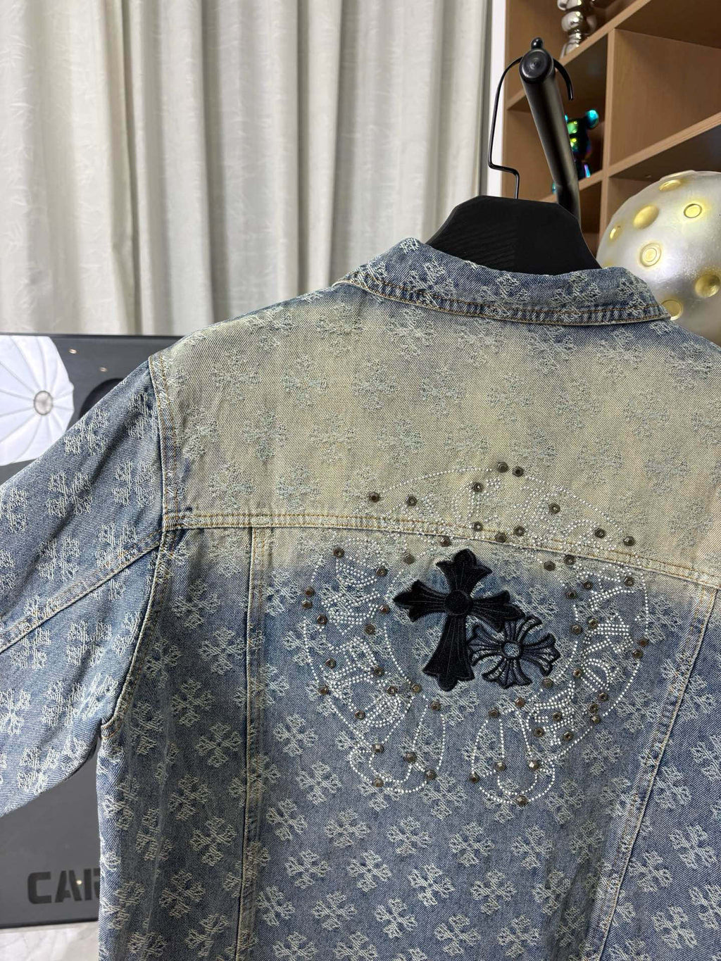 Long-sleeve denim jacket back yoke, blue wash with cross applique and rhinestone dots