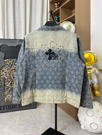 Long-sleeve denim jacket, blue wash, button front, back cross patch with studs