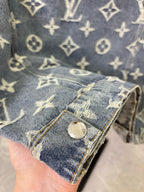 Denim garment cuff with Louis Vuitton monogram, button front and gold stitching detail