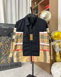 Burberry jacket in navy with plaid panels, front zipper, stand collar