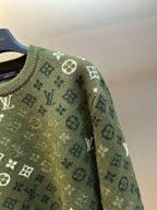 Louis Vuitton knit sweater sleeve in olive green with allover monogram pattern