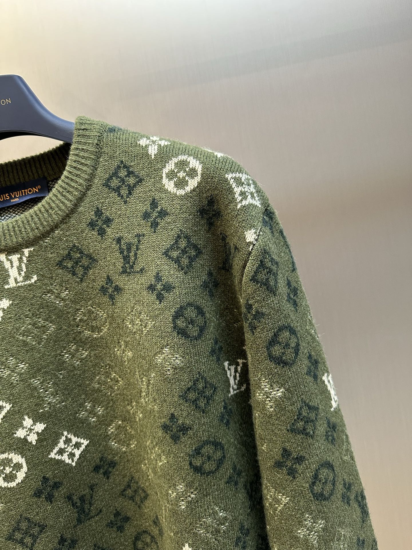 Louis Vuitton knit sweater sleeve in olive green with allover monogram pattern