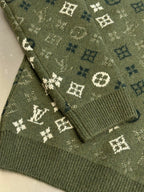 Louis Vuitton knit sweater hem detail in olive green with monogram pattern knit texture