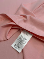 Light pink Dior T-shirt fabric with care and size label tag