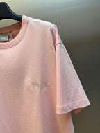 Light pink Dior T-shirt sleeve with embroidered Dior logo on the chest