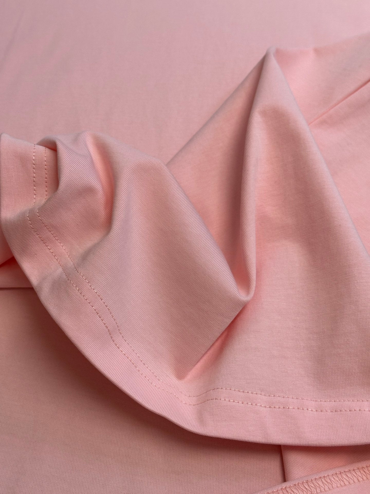 Pink Dior T-shirt sleeve hem and neckline seam detail