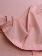 Light pink Dior T-shirt hem and sleeve stitching detail