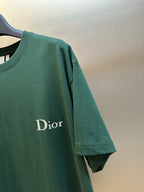 Green T-shirt with partial Dior logo on the front sleeve