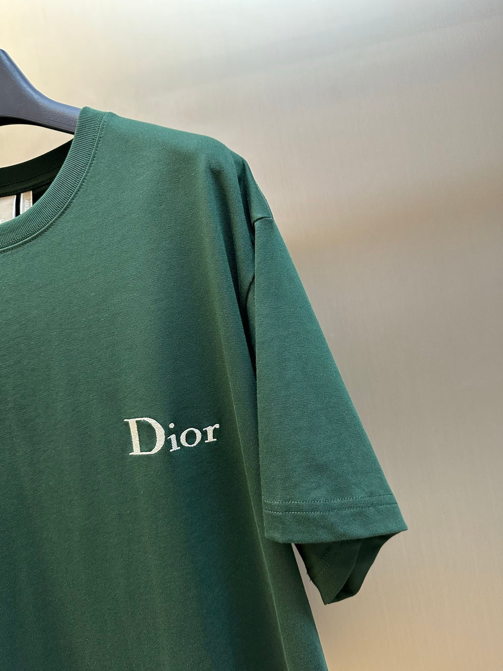 Dior short-sleeve T-shirt sleeve detail with white Dior logo print