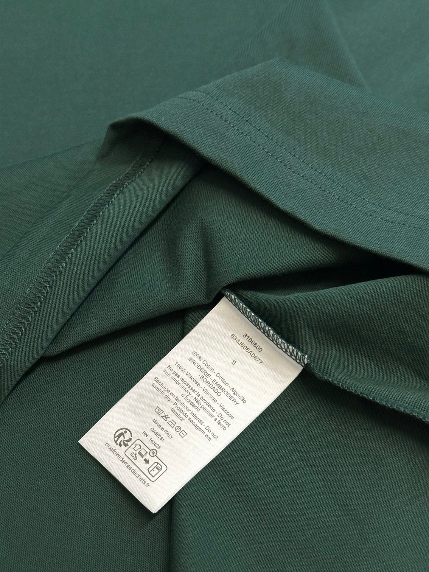 Dark green Dior short-sleeve T-shirt fabric with care label tag